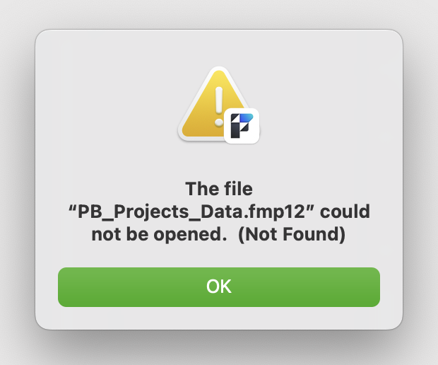 Screenshot of a FileMaker dialog indicating a required connected file cannot be found.